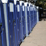 Row,Of,Portable,Toilets,On,City,Street